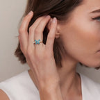 Blue Agio butterfly anxiety relief ring worn by woman