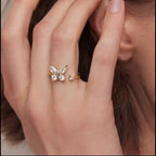 Gold Agio butterfly anxiety relief ring worn on hand