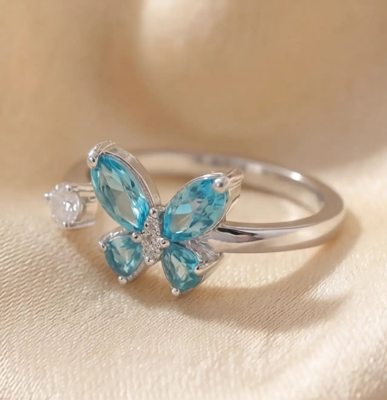Side view of silver Agio butterfly anxiety relief ring
