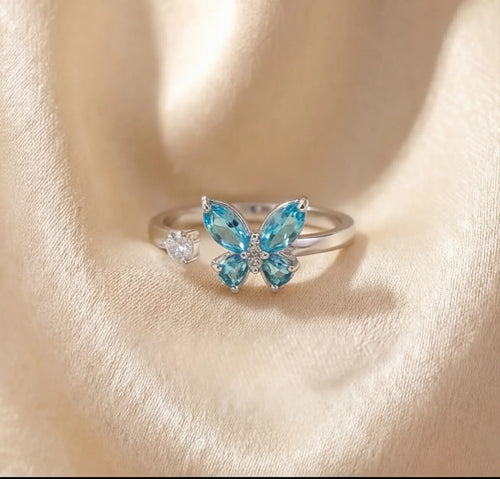 Silver Agio butterfly calm ring with blue stones