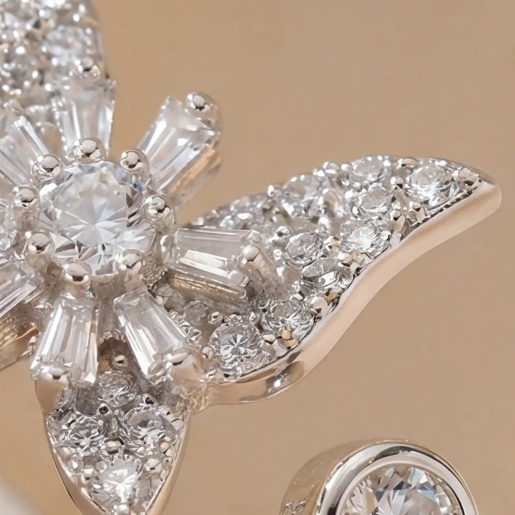 Close up detail of Raggio silver butterfly calm ring with white crystal pavé and adjustable open band